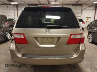 2006 Honda Odyssey LX with VIN 5FNRL38256B113667, listed as a IAAI auction lot 41856860 with 142,031 mi miles. Bid and sale history available at carsss.com. Image 17.