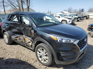 2019 Hyundai Tucson SE with VIN KM8J2CA43KU001216, listed as a Copart auction lot 54161225 with 50,645 mi miles and Salvage Title. Bid and sale history available at carsss.com. Image 4.