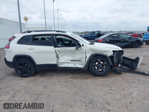 2019 Jeep Cherokee Latitude Plus with VIN 1C4PJLLBXKD405322, listed as a IAAI auction lot 41708104 with 93,295 mi miles and . Bid and sale history available at DreamBid. Image 13.