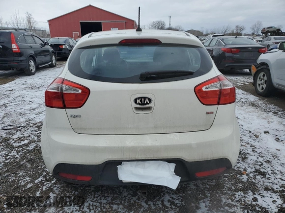 2014 Kia Rio LX with VIN KNADM5A35E6921756, listed as a Copart auction lot 84653184 with 181,703 mi miles and Salvage Title. Bid and sale history available at carsss.com. Image 6.