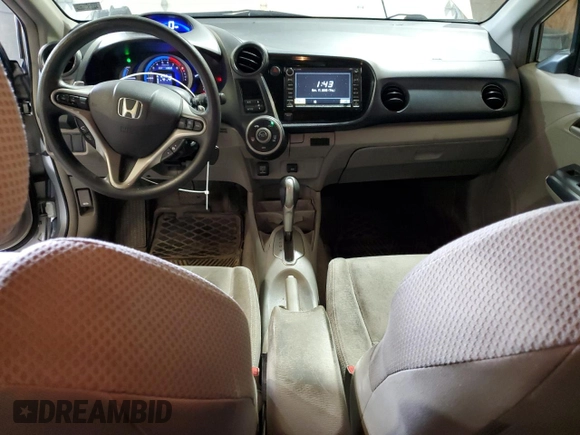 2010 Honda Insight EX with VIN JHMZE2H76AS021610, listed as a Copart auction lot 62992225 with 162,974 mi miles and Salvage title. Bid and sale history available at DreamBid. Image 8.