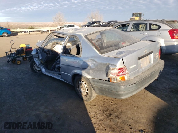 1996 Toyota Tercel DX z VIN JT2AC52L2T0193281, wystawiony jako Copart lot #85787774 z przebiegiem Nie podano mil oraz Szkody całkowita. Historia ofert i sprzedaży dostępna na DreamBid. Obrazek 2.