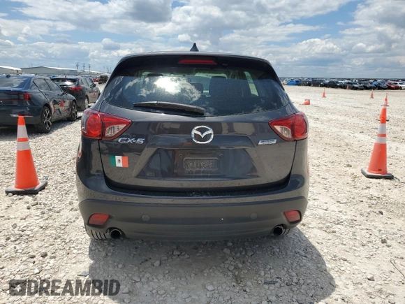 2014 Mazda CX-5 Sport z VIN JM3KE2BE8E0421316, wystawiony jako Copart lot #56548005 z przebiegiem 203 096 mil mil oraz Szkoda całkowita • Salvage title. Historia ofert i sprzedaży dostępna na DreamBid. Obrazek 6.