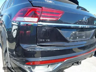 2023 Volkswagen Atlas Cross Sport 3.6L V6 SE w/Technology with VIN 1V2WE2CA0PC212559, listed as a IAAI auction lot 39032017 with 24,315 mi miles. Bid and sale history available at carsss.com. Image 17.