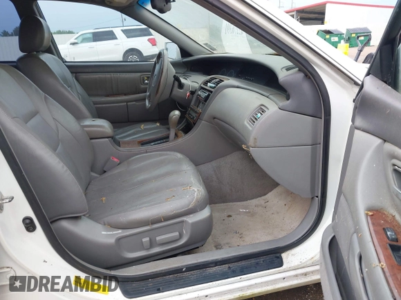2001 Toyota Avalon XL z VIN 4T1BF28B31U182971, wystawiony jako IAAI lot #42276391 z przebiegiem 226 582 mil mil oraz . Historia ofert i sprzedaży dostępna na DreamBid. Obrazek 5.