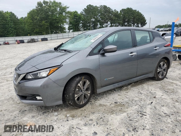 2018 Nissan LEAF SV with VIN 1N4AZ1CP1JC307031, listed as a Copart auction lot 58869215 with 99,621 mi miles and Salvage title. Bid and sale history available at DreamBid. Image 1.