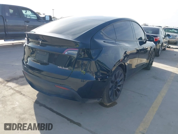 2022 Tesla Model Y Performance with VIN 7SAYGDEF6NF532027, listed as a IAAI auction lot 41717662 with 36,537 mi miles and . Bid and sale history available at DreamBid. Image 4.