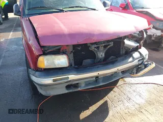 1995 GMC Jimmy SLE z VIN 1GKDT13W1SK528155, wystawiony jako IAAI lot #42177589 z przebiegiem 283 900 mil mil oraz . Historia ofert i sprzedaży dostępna na DreamBid. Obrazek 6.