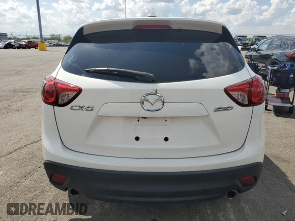 2015 Mazda CX-5 Touring with VIN JM3KE2CY7F0445603, listed as a Copart auction lot 54582225 with 123,319 mi miles and Clean Title. Bid and sale history available at carsss.com. Image 6.