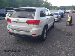 2014 Jeep Grand Cherokee Limited with VIN 1C4RJFBGXEC186833, listed as a IAAI auction lot 42677411 with 117,685 mi miles and . Bid and sale history available at DreamBid. Image 4.