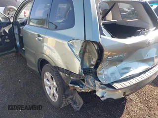 2014 Subaru Forester Premium with VIN JF2SJAEC2EH445669, listed as a IAAI auction lot 42772336 with 103,983 mi miles and . Bid and sale history available at DreamBid. Image 6.