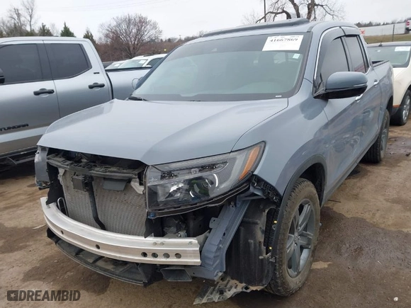2023 Honda Ridgeline RTL-E with VIN 5FPYK3F70PB030718, listed as a IAAI auction lot 41667869 with 18,768 mi miles. Bid and sale history available at carsss.com. Image 6.