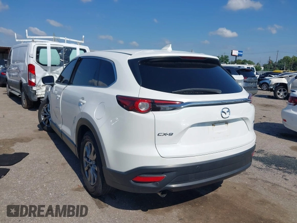 2019 Mazda CX-9 Touring with VIN JM3TCACY7K0314539, listed as a IAAI auction lot 42234361 with 98,299 mi miles and . Bid and sale history available at DreamBid. Image 3.