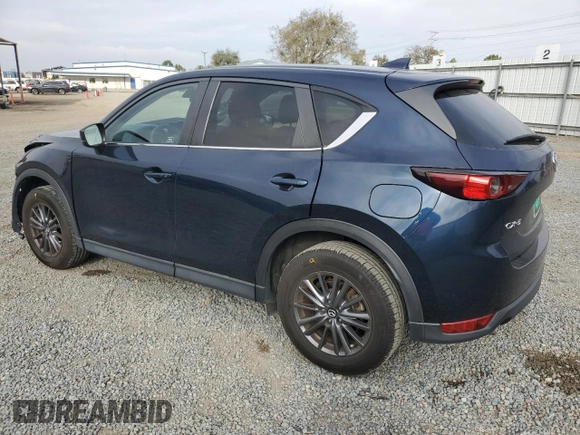 2021 Mazda CX-5 Touring with VIN JM3KFACM1M0313910, listed as a Copart auction lot 47834815 with 40,671 mi miles and Salvage Title. Bid and sale history available at carsss.com. Image 2.