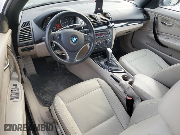 2011 BMW 1 Series 128i with VIN WBAUN1C58BVH82487, listed as a Copart auction lot 54295625 with 60,879 mi miles and Salvage title. Bid and sale history available at DreamBid. Image 8.