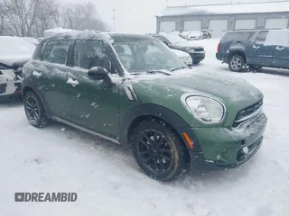 2015 MINI Cooper Countryman S with VIN WMWZC5C59FWP48946, listed as a IAAI auction lot 41298127 with 106,293 mi miles. Bid and sale history available at carsss.com. Image 1.