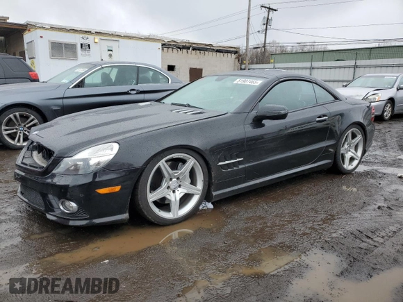2011 Mercedes-Benz SL 550 with VIN WDBSK7BA8BF165312, listed as a Copart auction lot 51907465 with 32,057 mi miles and Salvage title. Bid and sale history available at DreamBid. Image 1.