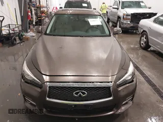 2015 Infiniti Q50 Premium z VIN JN1BV7ARXFM418280, wystawiony jako IAAI lot #42080879 z przebiegiem 126 411 mil mil oraz . Historia ofert i sprzedaży dostępna na DreamBid. Obrazek 12.