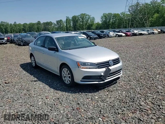 2015 Volkswagen Jetta SE z VIN 3VWD17AJ4FM417218, wystawiony jako Copart lot #61001125 z przebiegiem 84 159 mil mil oraz Szkoda całkowita • Salvage title. Historia ofert i sprzedaży dostępna na DreamBid. Obrazek 13.
