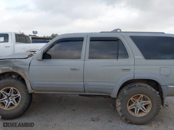 1998 Toyota 4Runner Limited with VIN JT3HN87R7W0184602, listed as a IAAI auction lot 41942100 with 272,823 mi miles. Bid and sale history available at carsss.com. Image 13.
