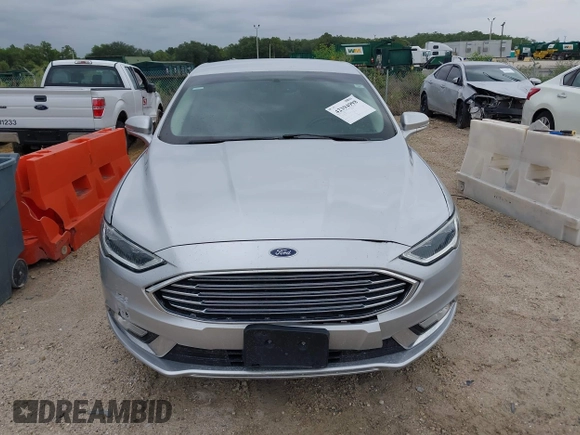 2017 Ford Fusion SE z VIN 3FA6P0HD5HR166433, wystawiony jako IAAI lot #42394998 z przebiegiem 121 333 mil mil oraz . Historia ofert i sprzedaży dostępna na DreamBid. Obrazek 12.