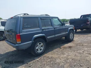 2001 Jeep Cherokee Sport z VIN 1J4FF48S51L531033, wystawiony jako IAAI lot #42423910 z przebiegiem 90 438 mil mil oraz . Historia ofert i sprzedaży dostępna na DreamBid. Obrazek 4.