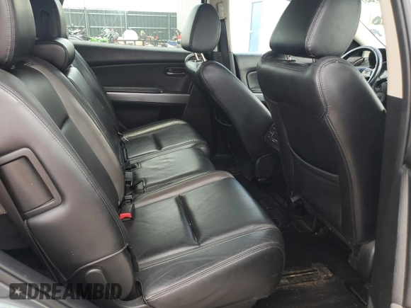 2012 Mazda CX-9 Grand Touring z VIN JM3TB2DA9C0350650, wystawiony jako Copart lot #60733775 z przebiegiem 246 128 mil mil oraz Szkoda całkowita • Salvage title. Historia ofert i sprzedaży dostępna na DreamBid. Obrazek 11.
