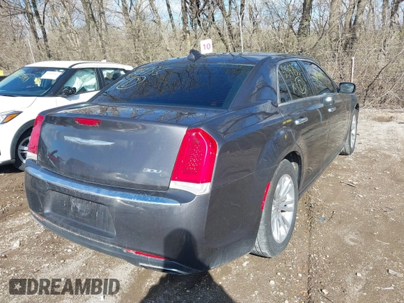 2017 Chrysler 300 with VIN 2C3CCAEG2HH559755, listed as a IAAI auction lot 41854444 with 135,744 mi miles. Bid and sale history available at carsss.com. Image 4.