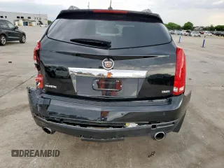2015 Cadillac SRX Premium Collection z VIN 3GYFNDE33FS574125, wystawiony jako Copart lot #55530575 z przebiegiem 76 956 mil mil oraz Szkoda całkowita • Salvage title. Historia ofert i sprzedaży dostępna na DreamBid. Obrazek 6.