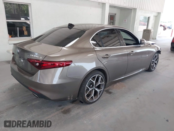 2019 Alfa Romeo Giulia Ti Sport with VIN ZARFAMBN1K7599269, listed as a IAAI auction lot 42271523 with 46,556 mi miles and . Bid and sale history available at DreamBid. Image 4.