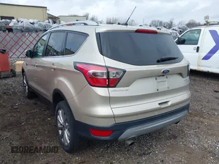 2017 Ford Escape Titanium with VIN 1FMCU9JD1HUB05881, listed as a IAAI auction lot 41966842 with 185,963 mi miles. Bid and sale history available at carsss.com. Image 3.