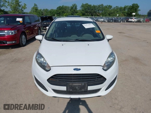 2014 Ford Fiesta S z VIN 3FADP4AJXEM211776, wystawiony jako IAAI lot #42574815 z przebiegiem 174 043 mil mil oraz . Historia ofert i sprzedaży dostępna na DreamBid. Obrazek 12.