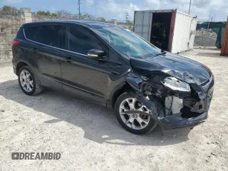 2013 Ford Escape SEL with VIN 1FMCU9H99DUD79003, listed as a Copart auction lot 51126005 with 104,151 mi miles and Clean Title. Bid and sale history available at DreamBid. Image 4.