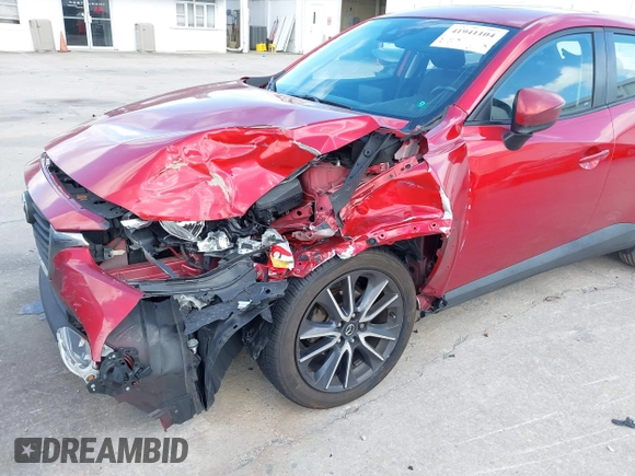 2018 Mazda CX-3 Touring with VIN JM1DKDC7XJ0318219, listed as a IAAI auction lot 41941104 with 86,186 mi miles. Bid and sale history available at carsss.com. Image 6.