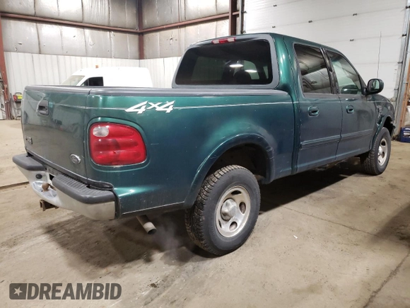 2001 Ford F-150 XLT with VIN 1FTRW08W41KD98737, listed as a Copart auction lot 64695065 with 179,158 mi miles and Clean title. Bid and sale history available at DreamBid. Image 3.