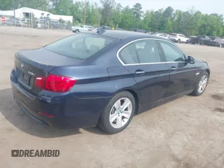 2013 BMW 5 Series 528i with VIN WBAXG5C52DD230956, listed as a IAAI auction lot 42107778 with 126,377 mi miles and . Bid and sale history available at carsss.com. Image 4.