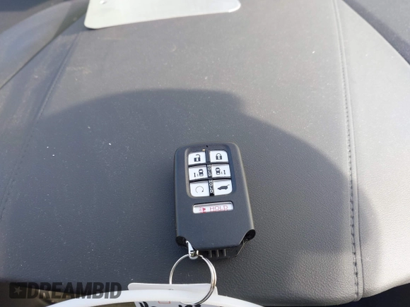 2024 Honda Odyssey EX-L with VIN 5FNRL6H6XRB070789, listed as a IAAI auction lot 41333384 with 6,553 mi miles and . Bid and sale history available at DreamBid. Image 11.