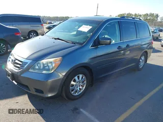 2010 Honda Odyssey EX-L with VIN 5FNRL3H76AB010388, listed as a IAAI auction lot 41678322 with 197,826 mi miles and . Bid and sale history available at carsss.com. Image 2.