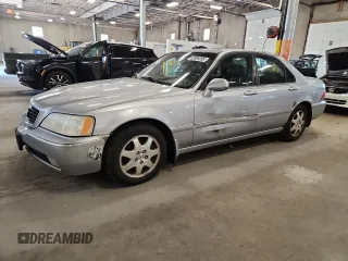 2002 Acura RL with VIN JH4KA96582C008005, listed as a Copart auction lot 63989285 with 201,583 mi miles and Salvage title. Bid and sale history available at DreamBid. Image 1.