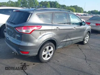 2013 Ford Escape SE with VIN 1FMCU0GX3DUC51805, listed as a IAAI auction lot 42481078 with 162,805 mi miles and . Bid and sale history available at DreamBid. Image 4.