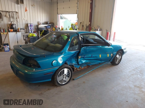 1994 Pontiac Grand Am z VIN 1G2NE15M5RM500643, wystawiony jako IAAI lot #42069901 z przebiegiem 77 129 mil mil oraz . Historia ofert i sprzedaży dostępna na DreamBid. Obrazek 4.