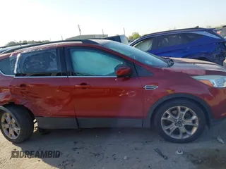 2015 Ford Escape SE with VIN 1FMCU9G93FUC32776, listed as a IAAI auction lot 41849714 with 135,875 mi miles. Bid and sale history available at carsss.com. Image 13.
