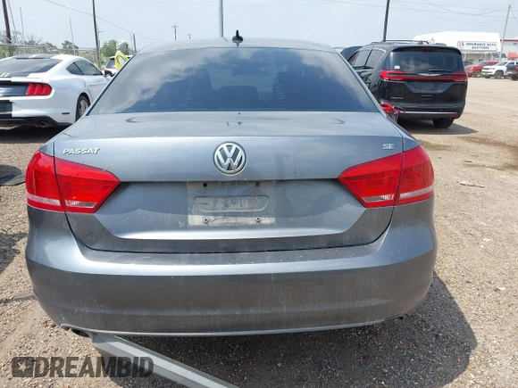 2013 Volkswagen Passat SE z VIN 1VWBH7A32DC011750, wystawiony jako IAAI lot #42199020 z przebiegiem 155 806 mil mil oraz . Historia ofert i sprzedaży dostępna na DreamBid. Obrazek 16.