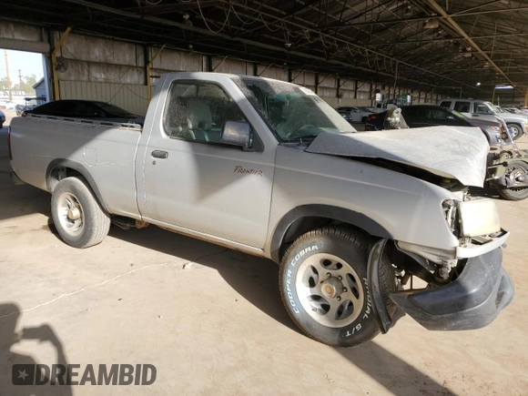 1998 Nissan Frontier XE with VIN 1N6DD21S1WC329392, listed as a Copart auction lot 73609304 with Not provided miles and Salvage title. Bid and sale history available at DreamBid. Image 4.