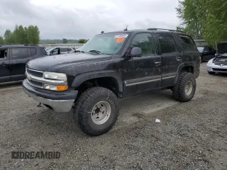 2005 Chevrolet Tahoe Z71 z VIN 1GNEK13T25R215823, wystawiony jako Copart lot #57489585 z przebiegiem 232 126 mil mil oraz Czysty tytuł • Clean title. Historia ofert i sprzedaży dostępna na DreamBid. Obrazek 1.