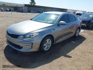 2016 Kia Optima LX with VIN 5XXGT4L39GG116566, listed as a IAAI auction lot 41949407 with 82,679 mi miles. Bid and sale history available at carsss.com. Image 2.