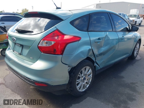 2012 Ford Focus SE with VIN 1FAHP3K24CL394495, listed as a IAAI auction lot 42034167 with 66,833 mi miles and . Bid and sale history available at carsss.com. Image 4.