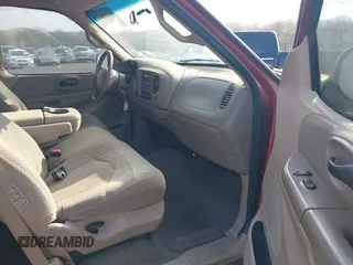 2001 Ford F-150 XL with VIN 1FTRX18L41KF38469, listed as a IAAI auction lot 41954075 with 219,967 mi miles. Bid and sale history available at carsss.com. Image 5.