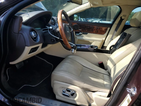 2012 Jaguar XJ Supersport z VIN SAJWA2JC4CMV21796, wystawiony jako Copart lot #66258395 z przebiegiem 122 190 mil mil oraz Czysty tytuł • Clean title. Historia ofert i sprzedaży dostępna na DreamBid. Obrazek 7.