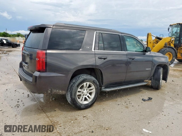 2015 Chevrolet Tahoe LS z VIN 1GNSCAKC4FR113247, wystawiony jako Copart lot #55578085 z przebiegiem 194 023 mil mil oraz Szkoda całkowita • Salvage title. Historia ofert i sprzedaży dostępna na DreamBid. Obrazek 3.